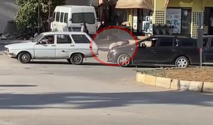 Adana Kozan'da bozulan otomobili çekmek için halat yerine çocuğu kullandılar