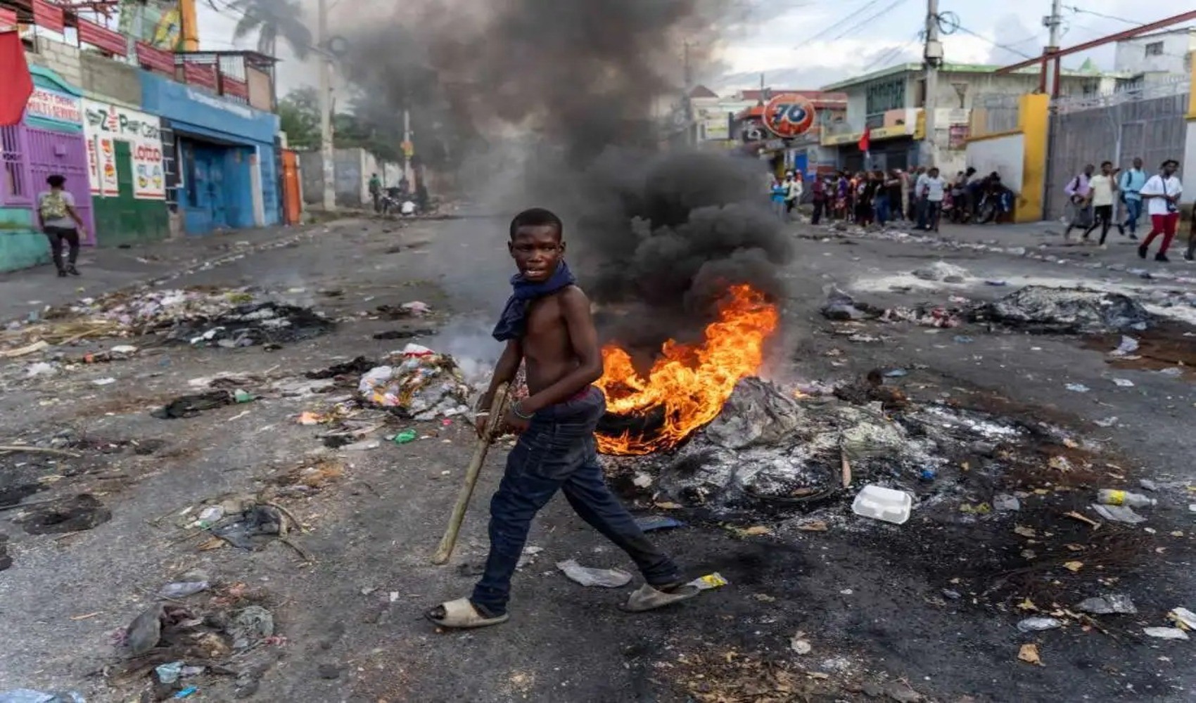 Haiti'de çeteler, sokakları ateşe verdi: Çete baskınında 'katliam'