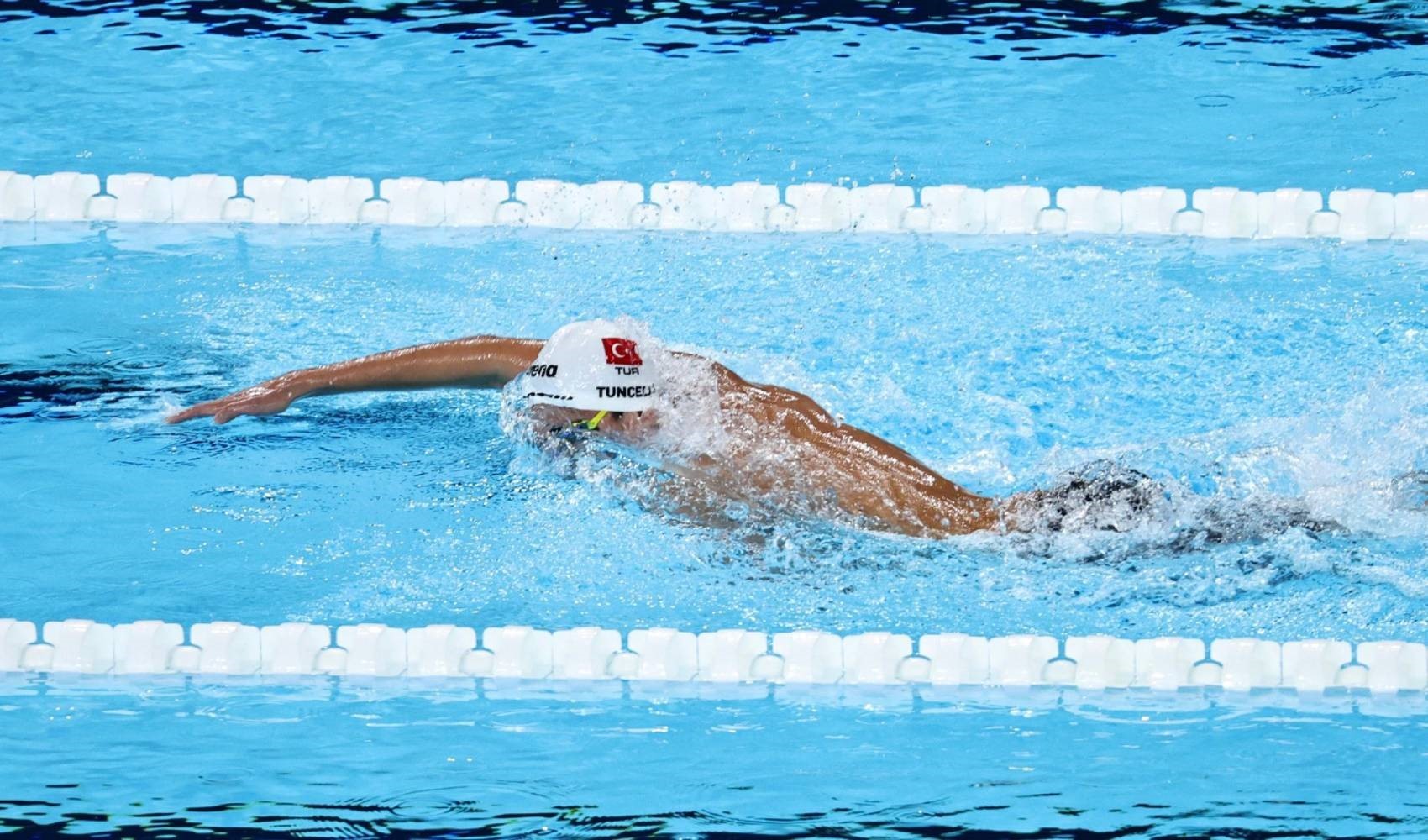 Türkiye'nin Olimpiyatlar tarihinde bir ilk... Milli yüzücü Kuzey Tunçelli finale yükseldi