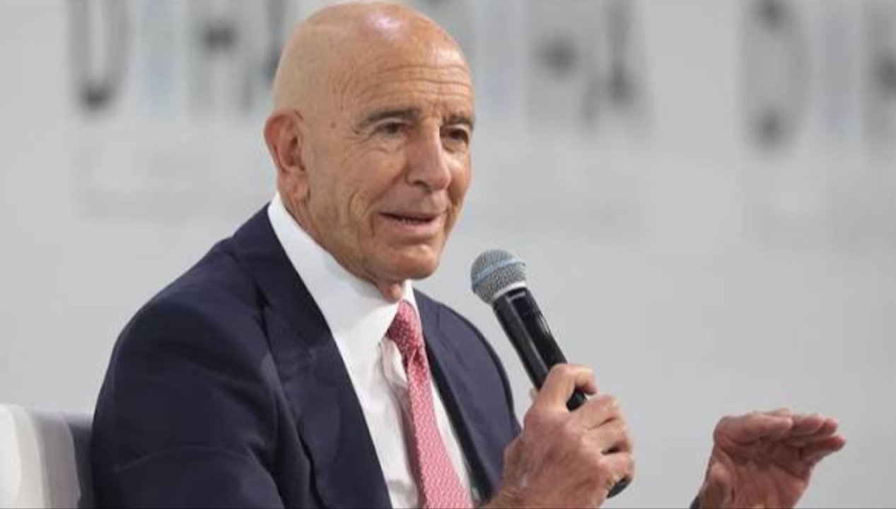A photograph of US Ambassador to Ankara Tom Barrack speaking into a microphone.