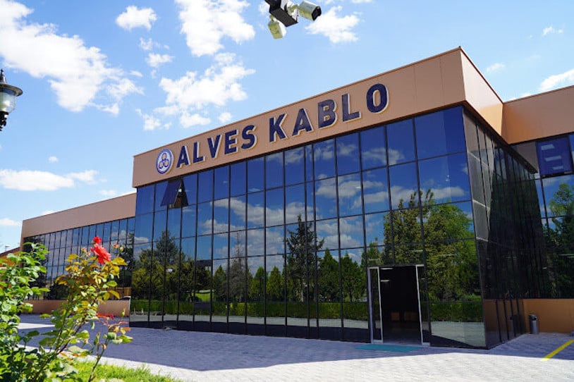 Exterior of the factory building with Alves Kablo written on it.