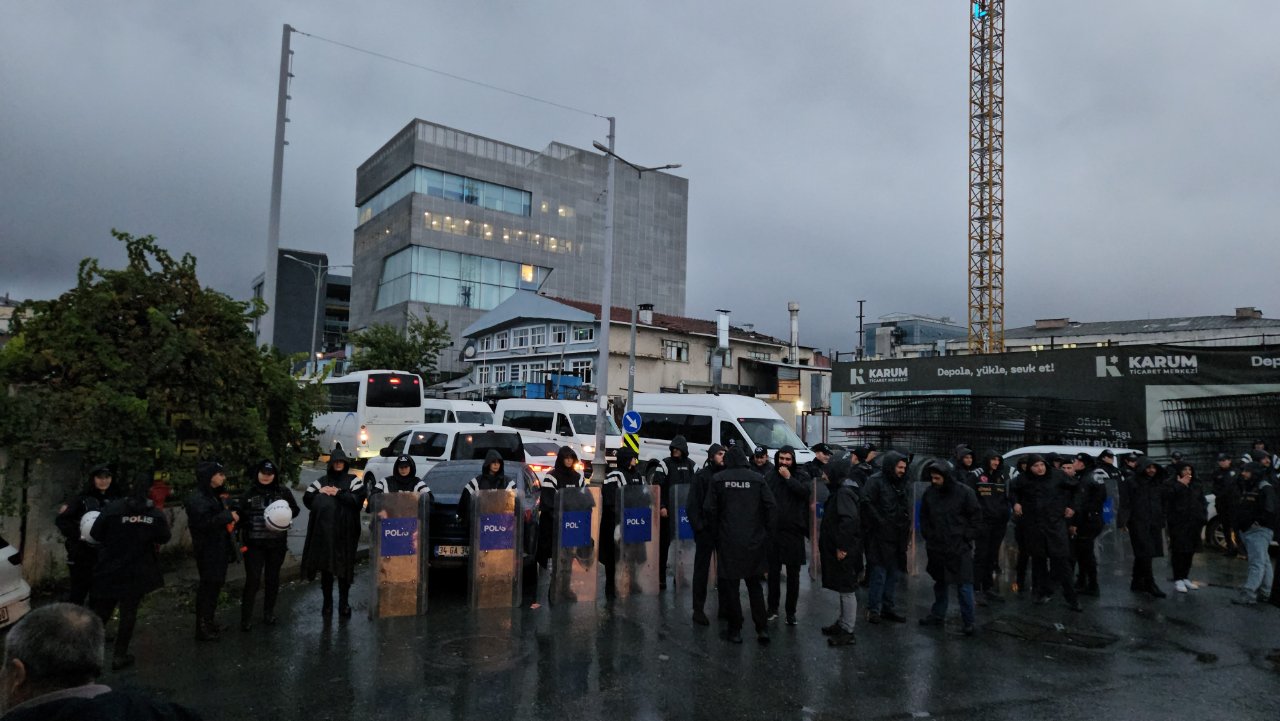 Police teams and vehicles are seen in front of the Halk TV building.
