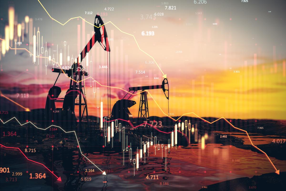 Oil pumps and charts symbolizing the energy market.