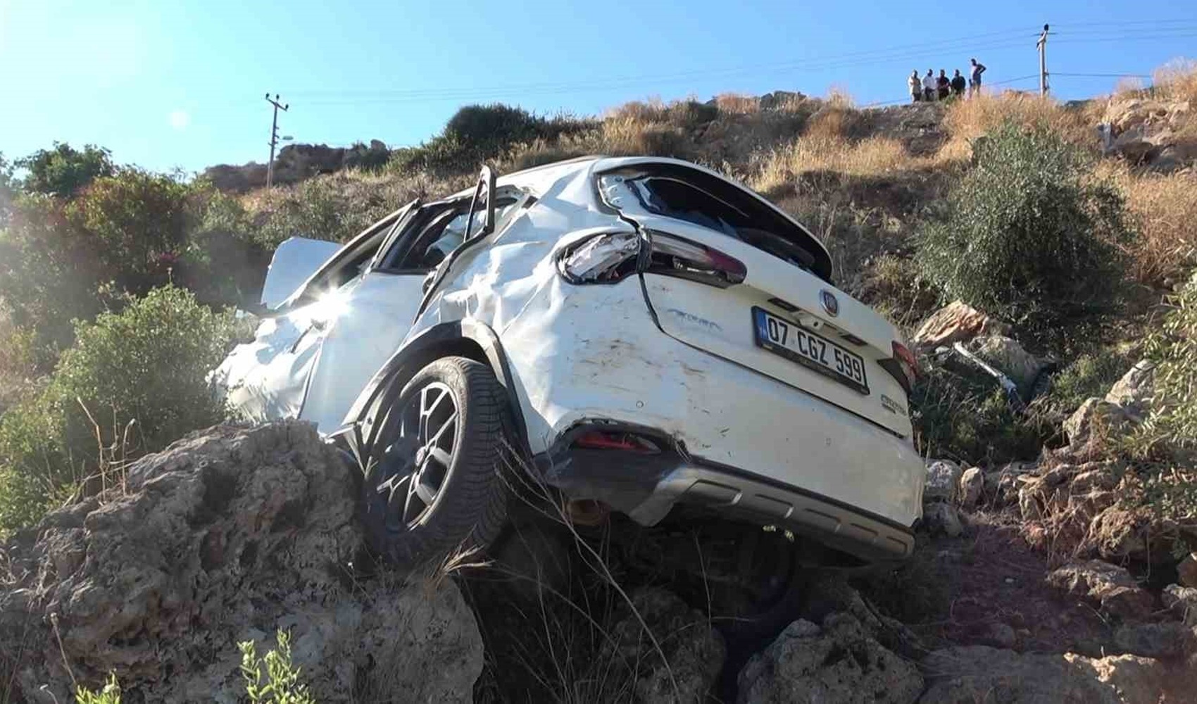 Car plunges off cliff in Antalya