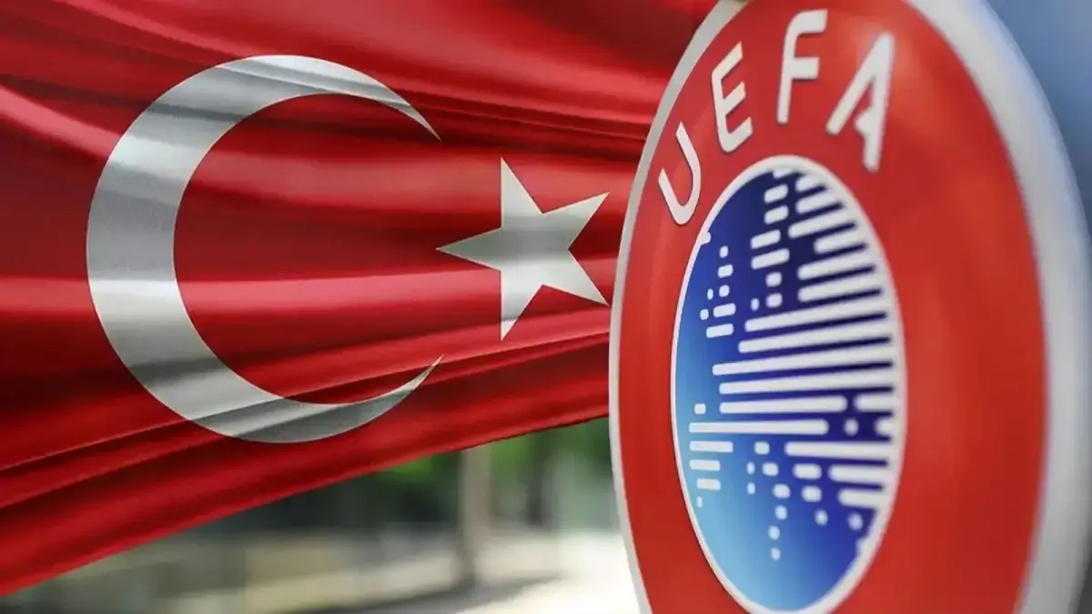 Türk bayrağı ve UEFA logosunun yer aldığı ülke puanı görseli.