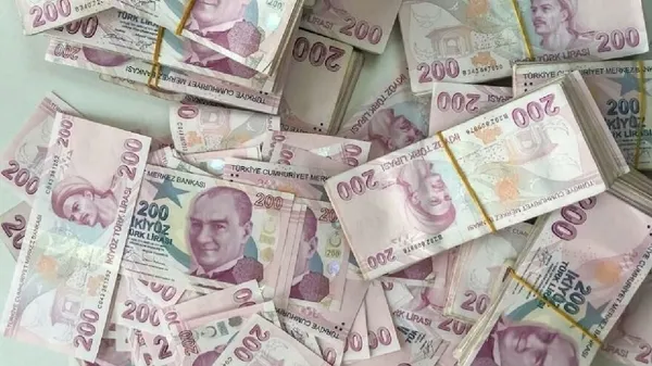 Image featuring numerous stacks of 200 Turkish Lira banknotes.