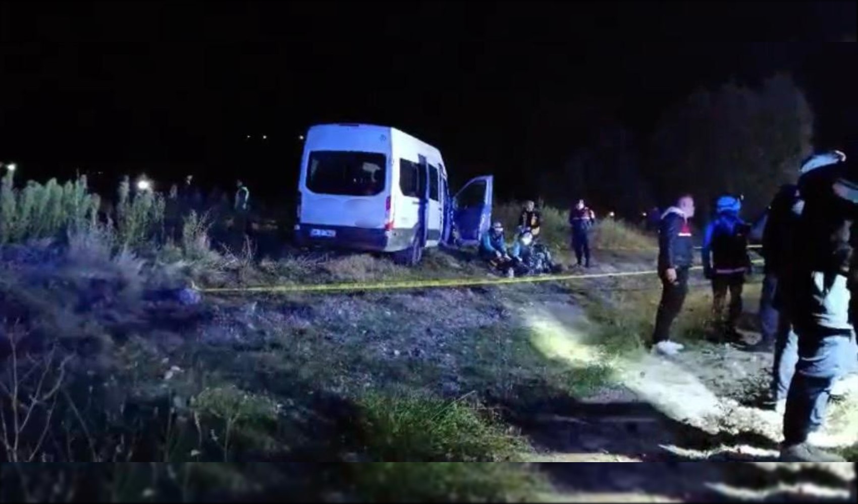 Two worker shuttle buses and a construction vehicle collide