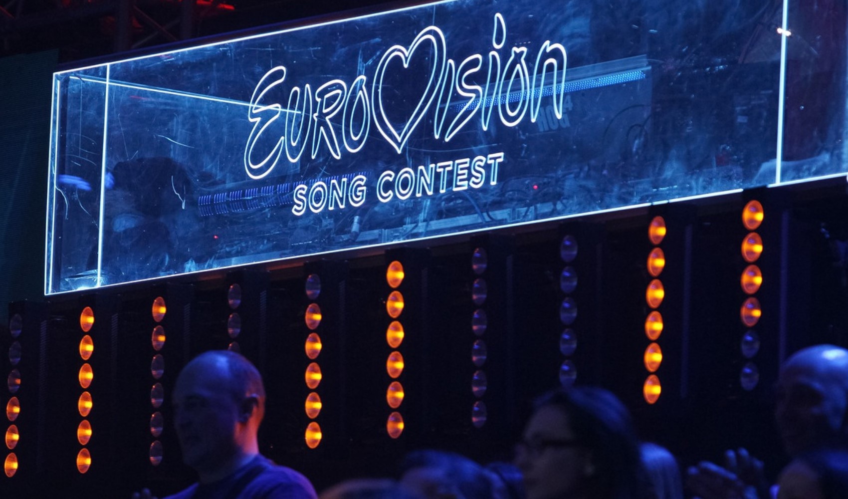 Illuminated stage sign reading Eurovision Song Contest.