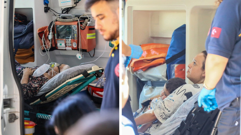 Ambulansta sağlık ekipleri tarafından müdahale edilen dumandan etkilenmiş kişiler.