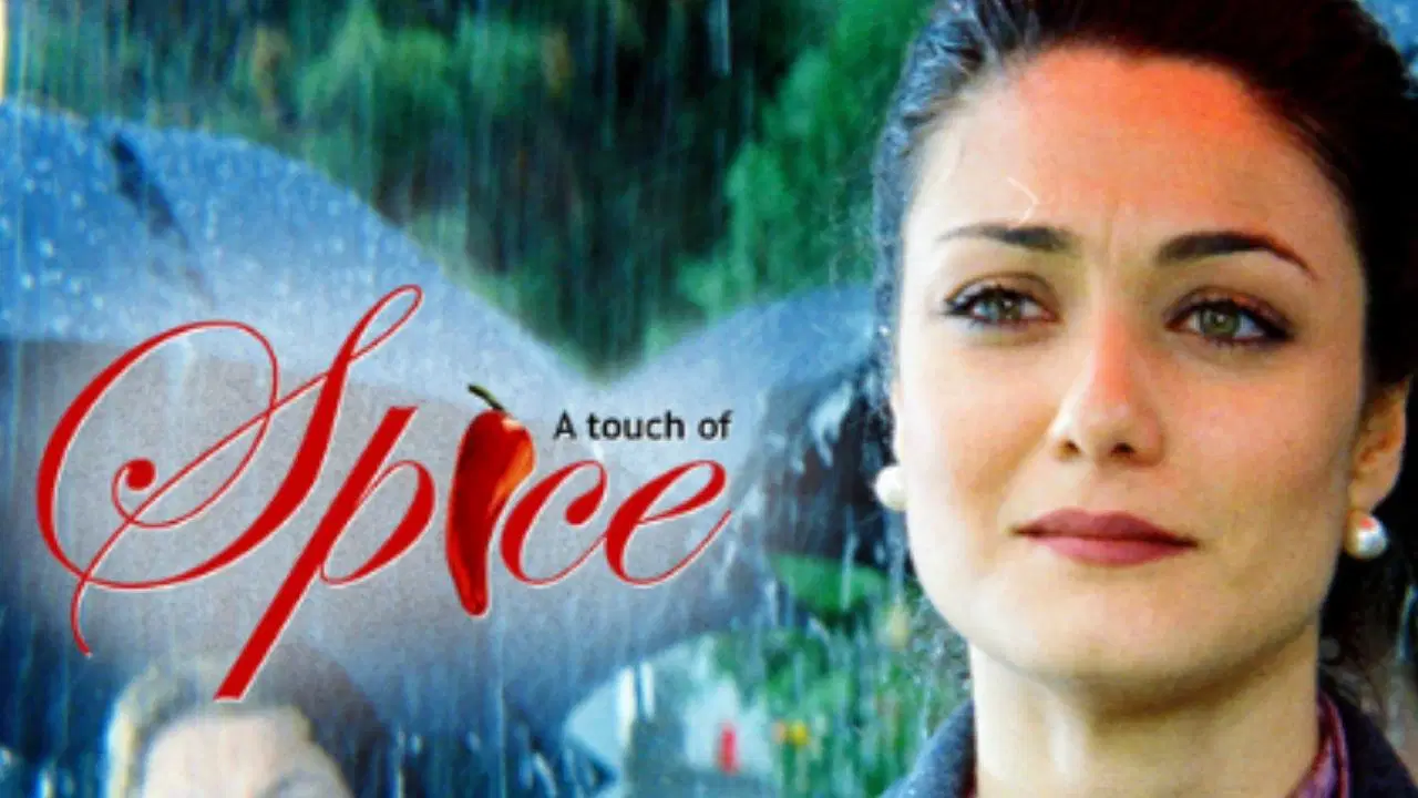 A Touch of Spice film görselinde bir kadın portresi ve film adını çağrıştıran tasarım öğeleri.