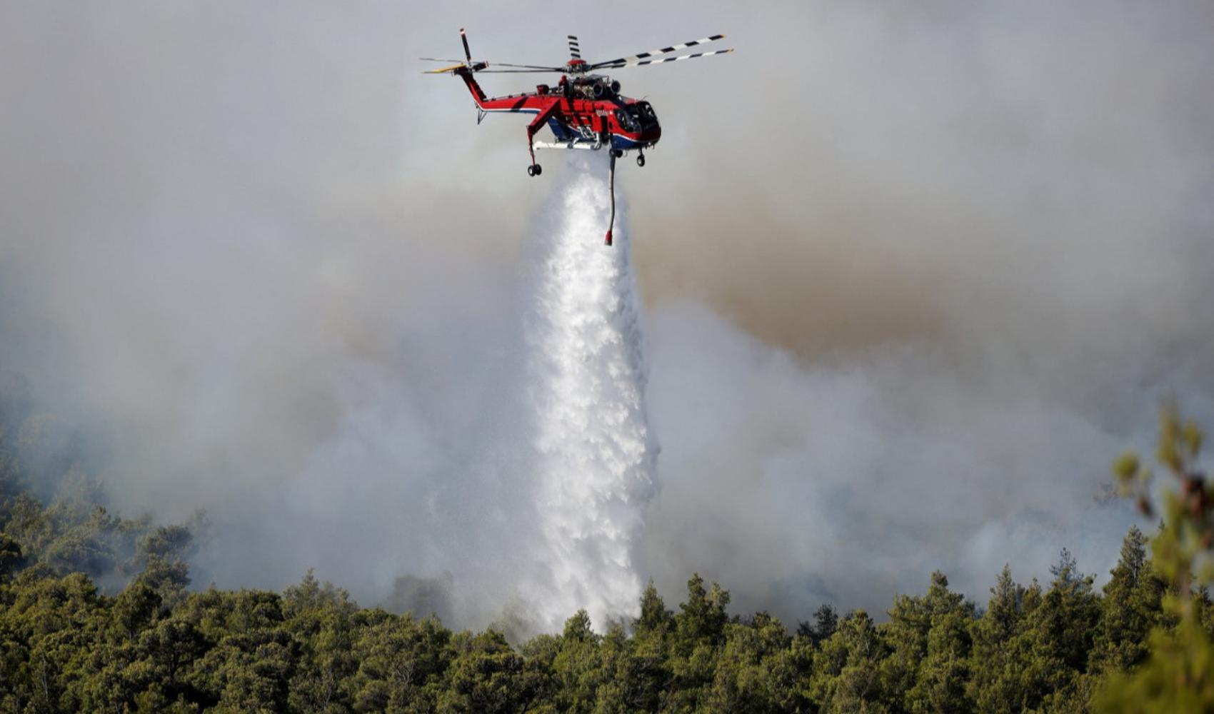 Two firefighting helicopters collide