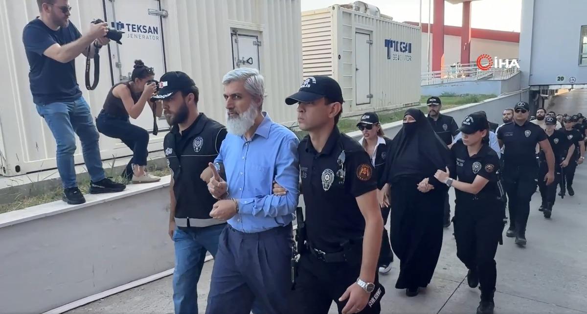 Alparslan Kuytul and other suspects are led by police teams.