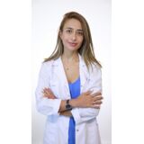 Portrait of white-coated obstetrician and gynecologist Op. Dr. Zarife Kerimova.