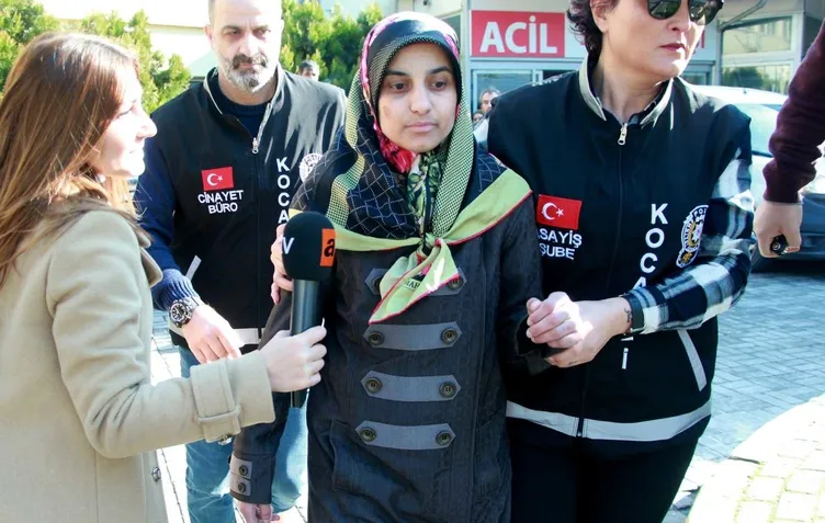 Polis ekipleri eşliğinde adli süreç sırasında götürülen bir sanık görüntüsü