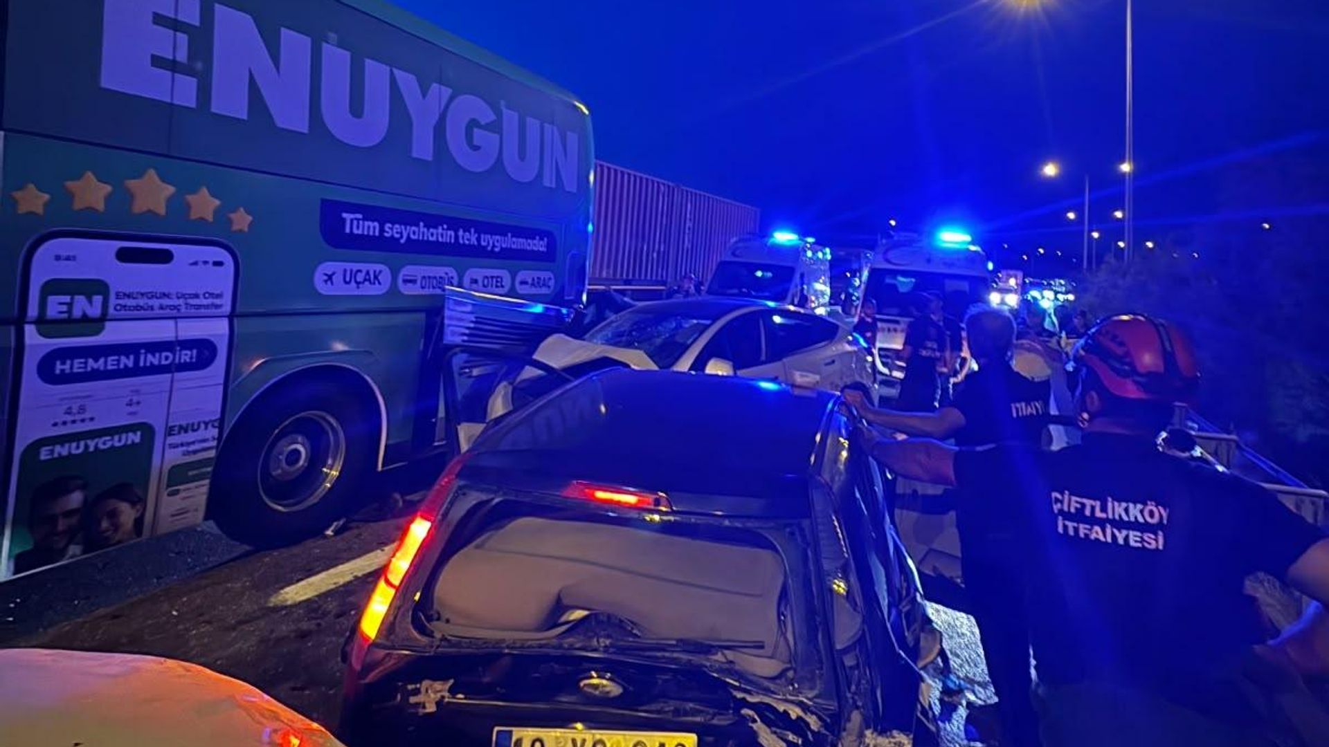 Vehicles and emergency response teams are seen after the chain-reaction accident on the Istanbul-Izmir Highway.