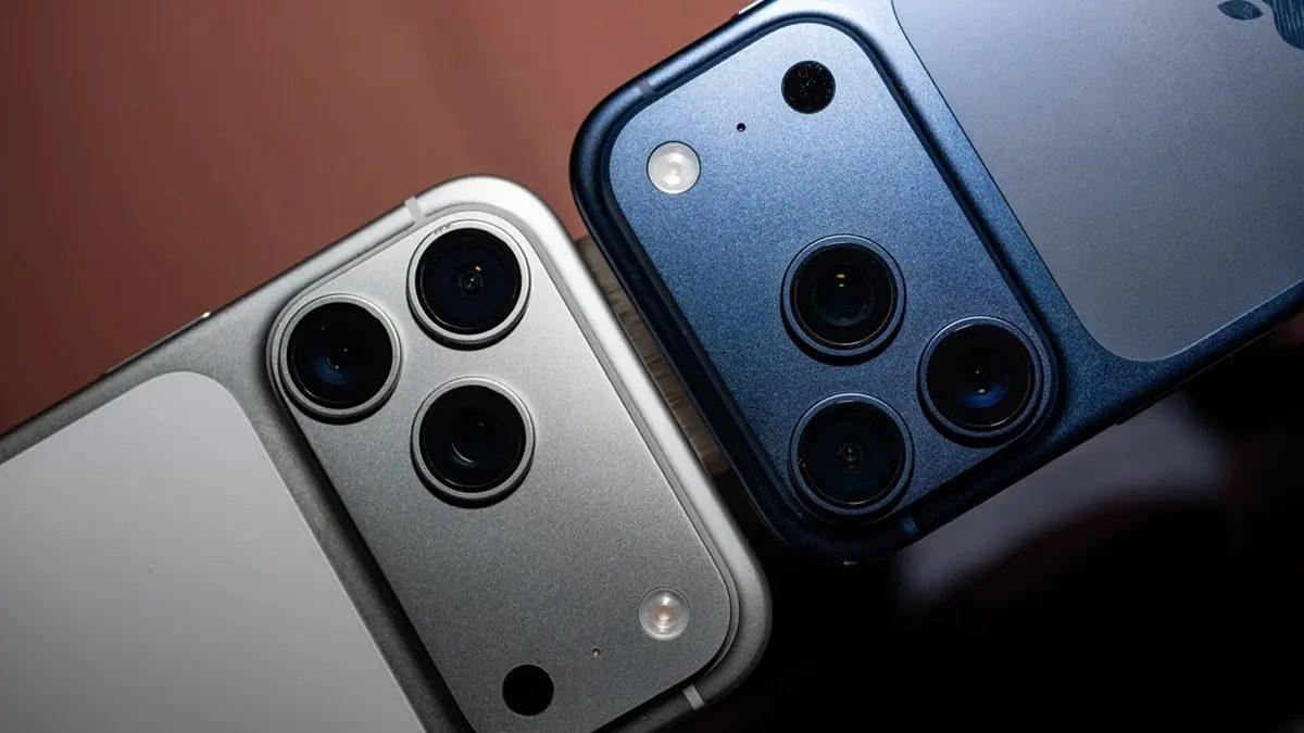 Close-up image showing the rear camera modules of two iPhone models.