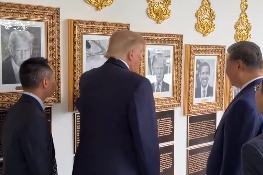 Trump and Xi Jinping are seen talking in front of framed portraits in a White House corridor.