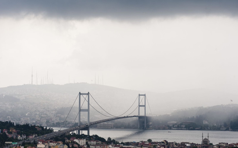 View of the Bosphorus and bridge in cloudy and rainy weather.