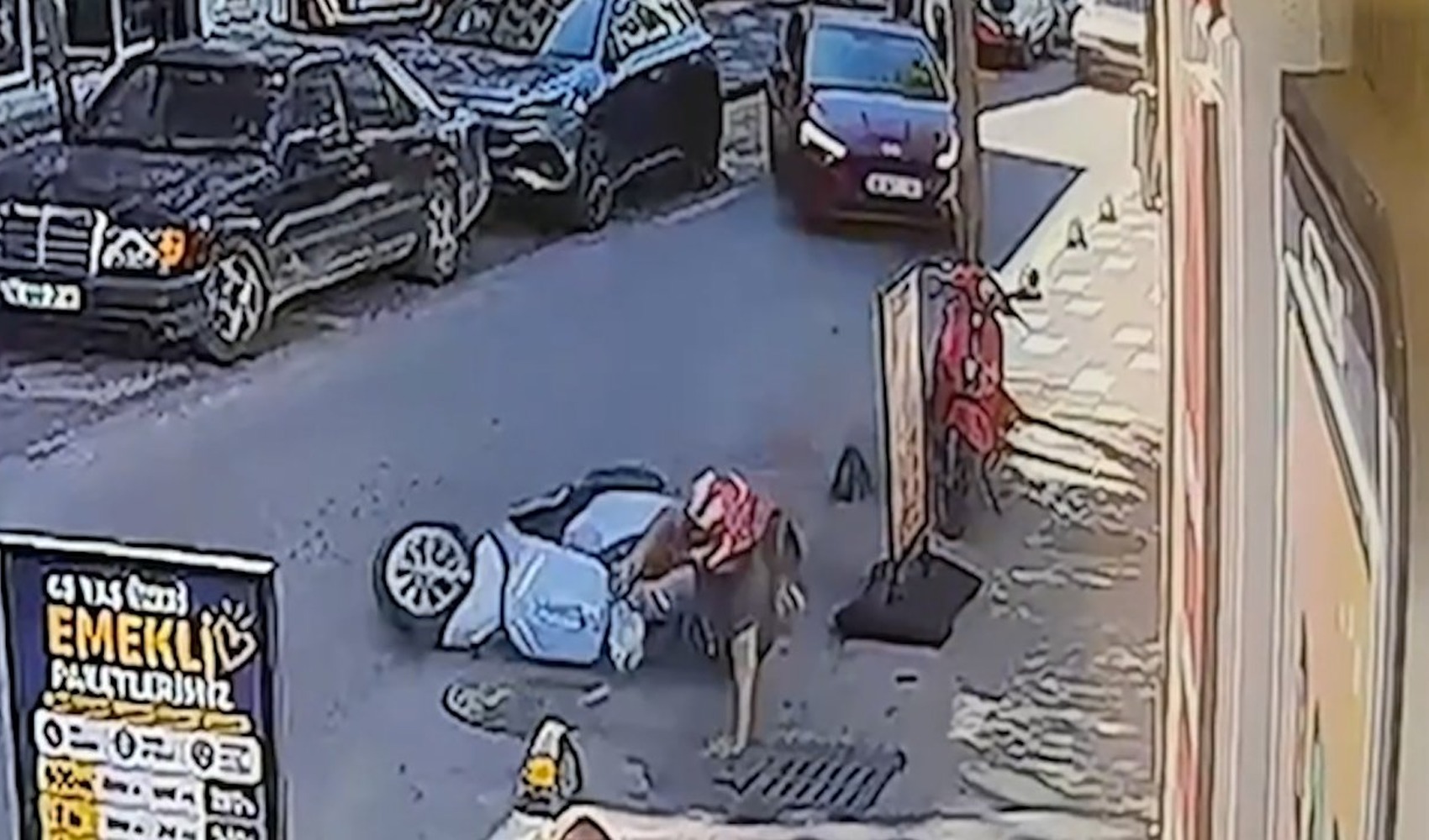 Motorcyclist hits stone bollard while maneuvering to avoid car